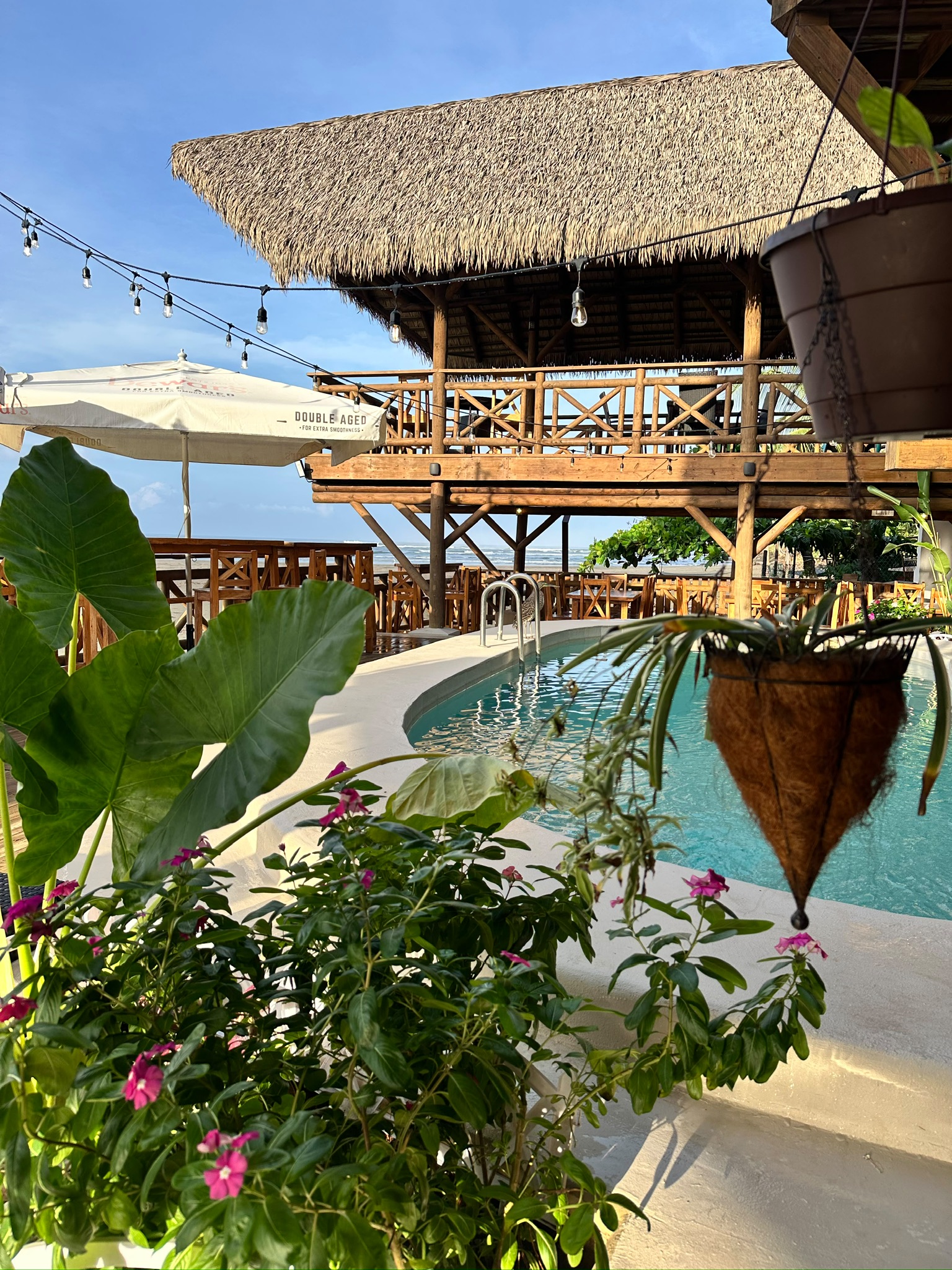 Pool and open-air decks by the beach